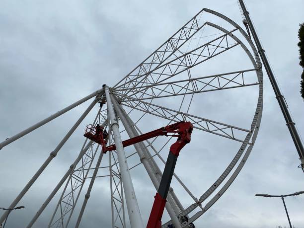 istock Huge Feria wheel being built by a special machine 1394535154