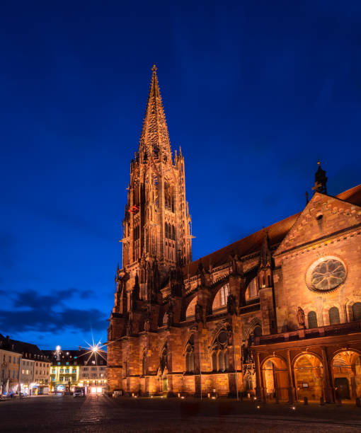 Freiburg Minster is the cathedral of Freiburg im Breisgau, southwest Germany - vertical photo in blue hour