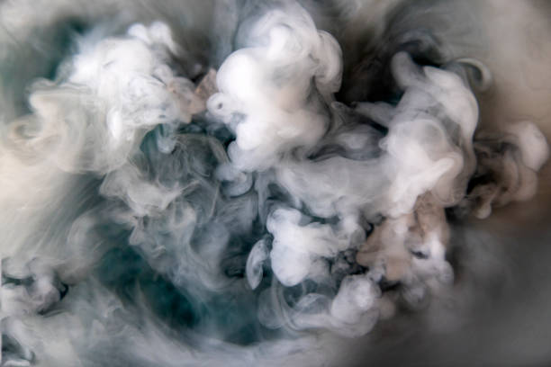 blue smoke isolated on a black background. fractal. spiral.