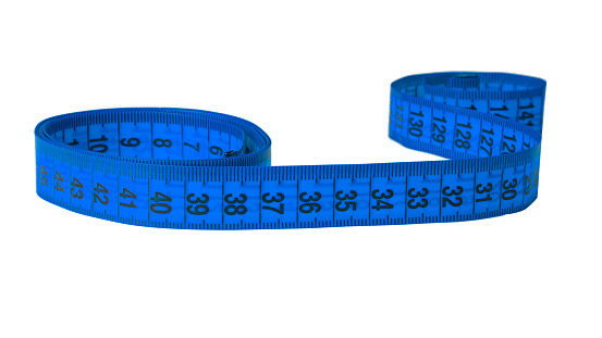 Spiral color tape measure isolated on the white background