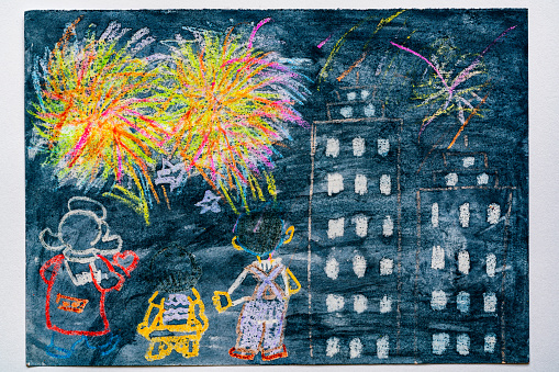 Colorful drawing -Three happy little kids watching fireworks