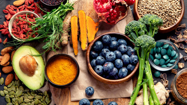 istock Healthy food clean eating selection on dark background. 1394553256