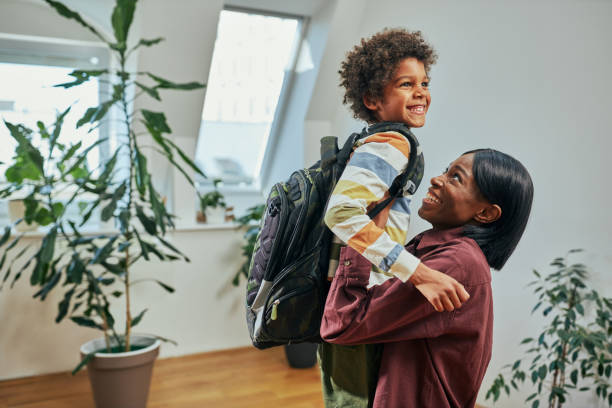 istock Mother and boy before first day at school 1394554771