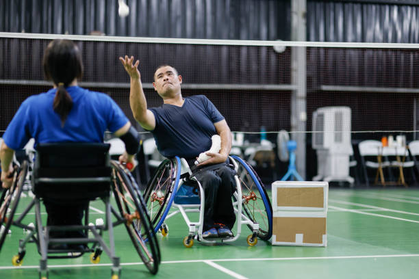 istock Handicapped badminton players actively training their skills 1394555257