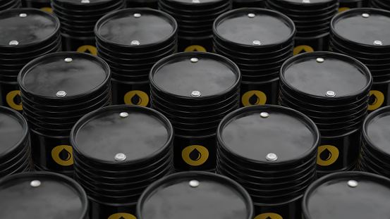 Storage of metal barrels with oil and gasoline. Environment disaster concept.