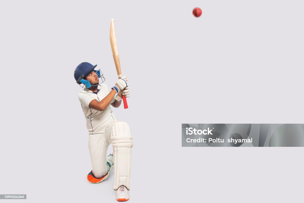 Portrait of boy hitting a shot  During a Cricket Game Cricket concept Cricket Player Stock Photo