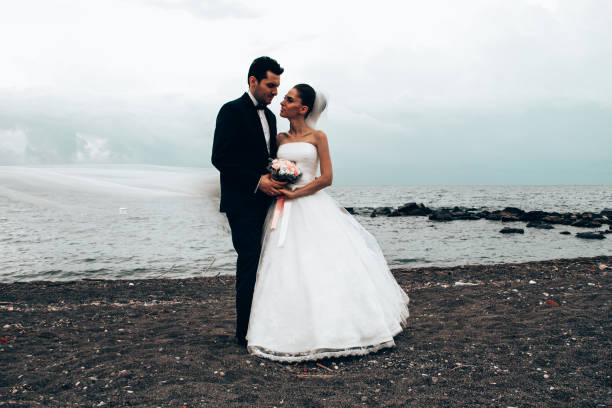 Newlyweds on the beach.