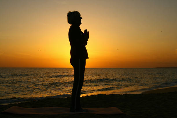 istock A yoga posture on the beach 1394560700