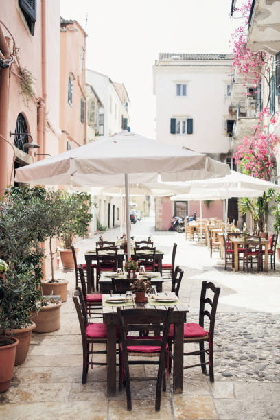 istock Picturesque street with cafes, Corfu, Greece 1394562049