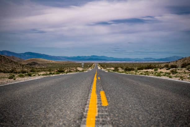 istock Empty Road In California desert. 1394564531