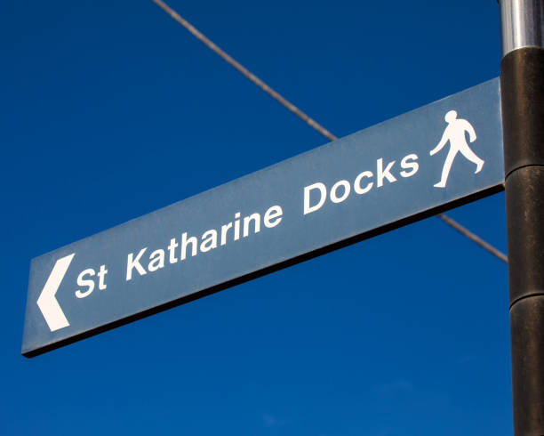 istock Signpost for St. Katherines Dock in London, UK 1394565039
