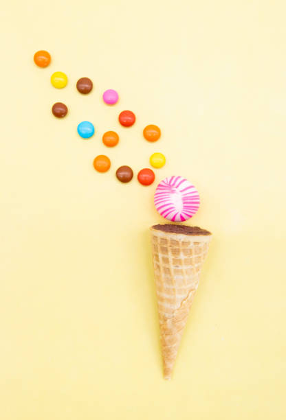 istock Colorful candies over on colored background 1394566610