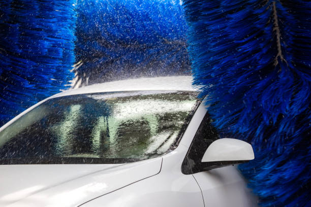 istock Washing the car in an automatic washing machine. Brushed Car Washing Machine 1394573624