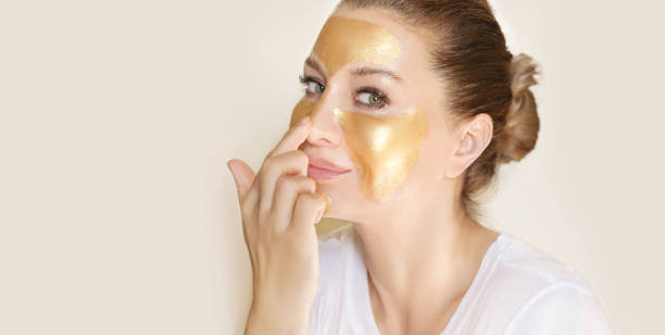 istock Concept of rejuvenation.Volume lifting.Applying the cream 1394575500