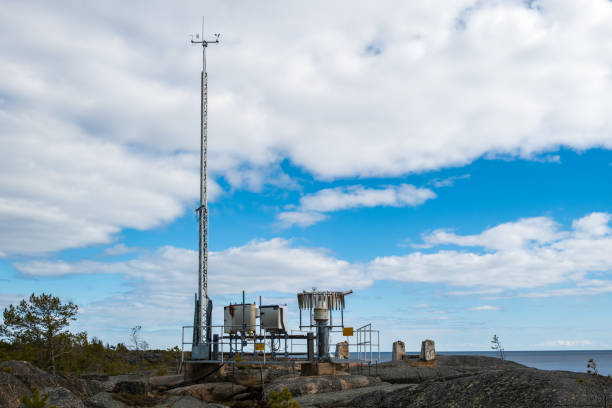 Measurement station for weather. Measurement station for weather owned by Swedish Meteorological and Hydrological Institute (SMHI) this can also measure the land rise of high coast (about 8 cm per year). meteorology equipment stock pictures, royalty-free photos & images