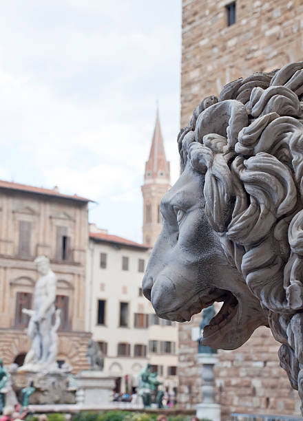 istock Sculpture in the foreground of a lion 139458849