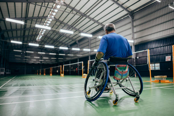 istock Enjoy life - Asian handicapped people training badminton 1394593423