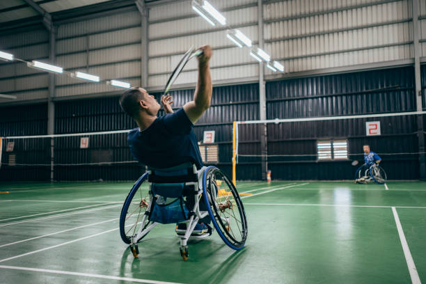 istock Enjoy life - Asian handicapped people training badminton 1394593711