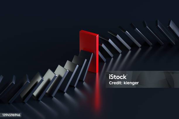 Row Of Falling Domino Stones Stopped By Red Domino Stone Over Black Background Risk Management Intervene Or Prevention Concept 3d Rendering Stock Photo - Download Image Now