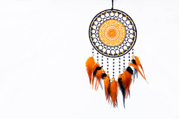 istock Handmade dream catcher with feathers threads and beads rope hanging 1394601107