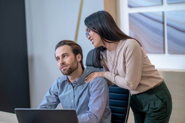 istock Assistant giving a relaxing massage to her boss 1394601324