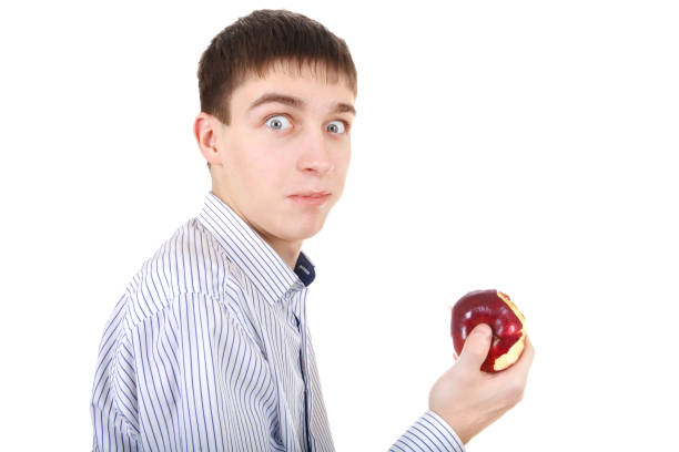 istock Surprised Teenager with an Apple 1394602730