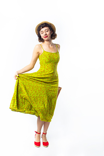 Woman Shopping Portrait of Happy Woman in Green Dress , Studio Shot Young Woman