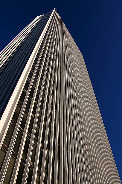 istock Office Tower before the Cloudless Sky on a Sunny Day 139460578