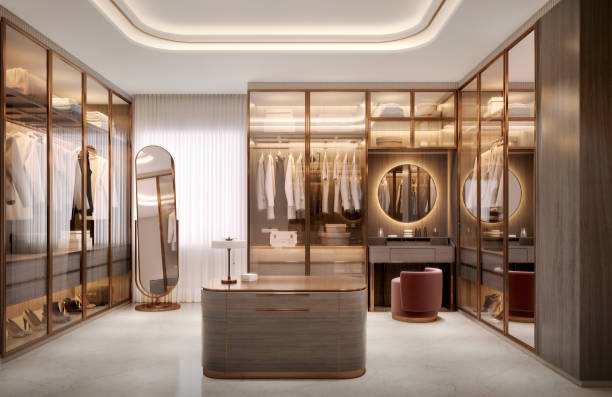 Luxury walk in closet interior with wood and gold elements.3d rendering stock photo