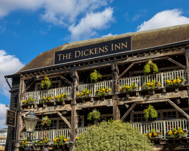 London, UK - March 17th 2022: The beautiful exterior of The Dickens Inn public house, located on St. Katherine Docks in London, UK.