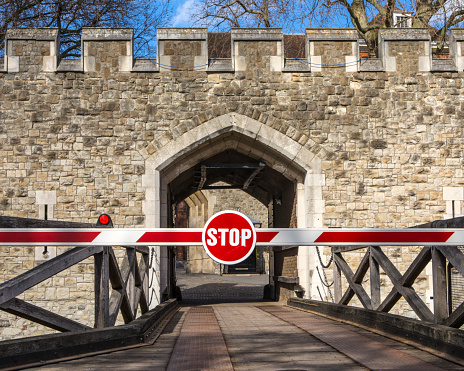A STOP sign at one of the entrances to the historic Tower of London in London, UK.