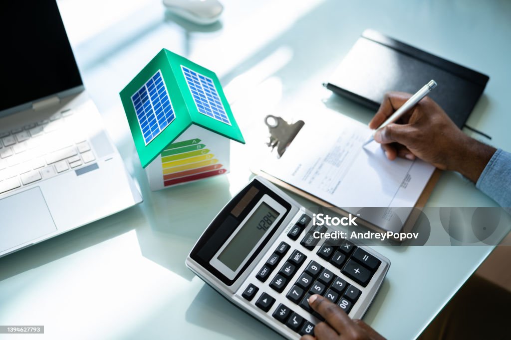 Energy Efficient House Calculator Energy Efficient House Calculator. Insulation Rate Audit Audit Stock Photo