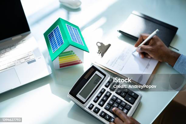 Energy Efficient House Calculator Stock Photo - Download Image Now - Audit, Vitality, Real Estate