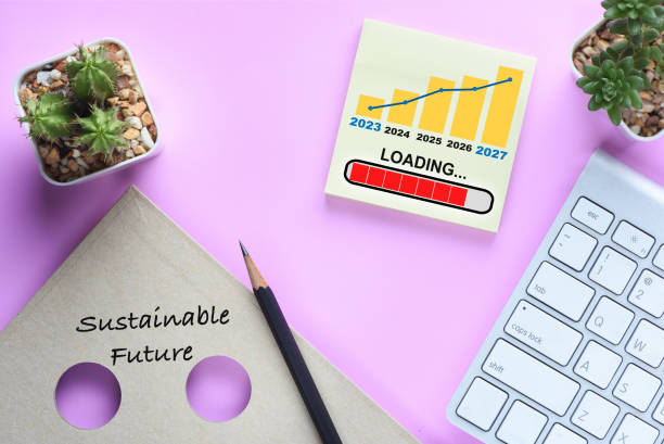 istock Business sustainable strategy loading with economic growth graph on sticky note and keyboard on desk 1394628976