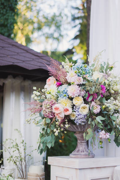 istock Beautiful fresh flower composition in a vase. 1394630155