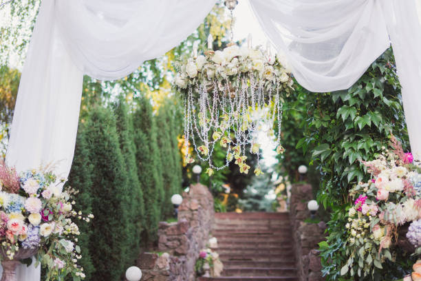 istock Stylish floral decoration with orchids for wedding ceremony. 1394630159