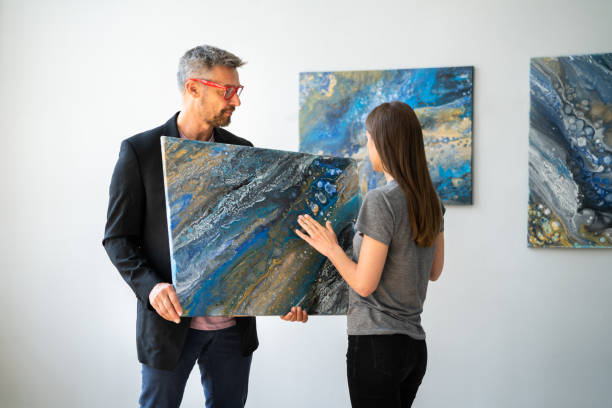 istock Art Painting Exhibition. Looking To Buy Modern Artwork 1394630332