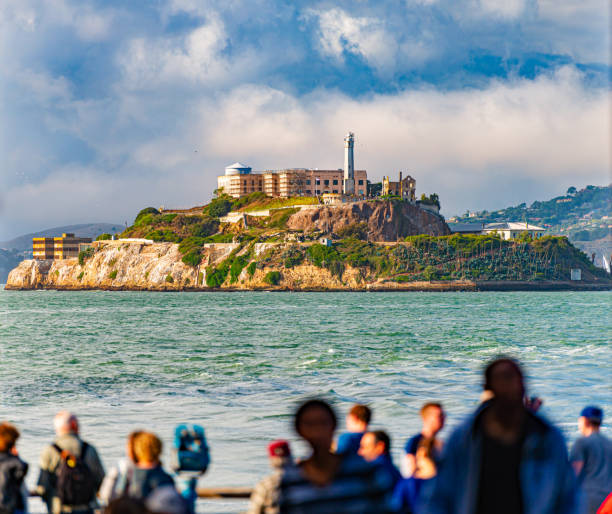 Alcatraz prison island in bay of San Francisco Alcatraz prison island in bay of San Francisco, California, US alcatraz island stock pictures, royalty-free photos & images