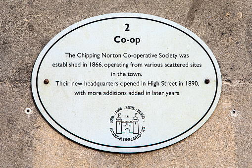 Chipping Norton, UK - April 10th 2022: Plaque dedicated to The Chipping Norton Co-operative Society, located in the town of Chipping Norton, in Oxfordshire, UK.