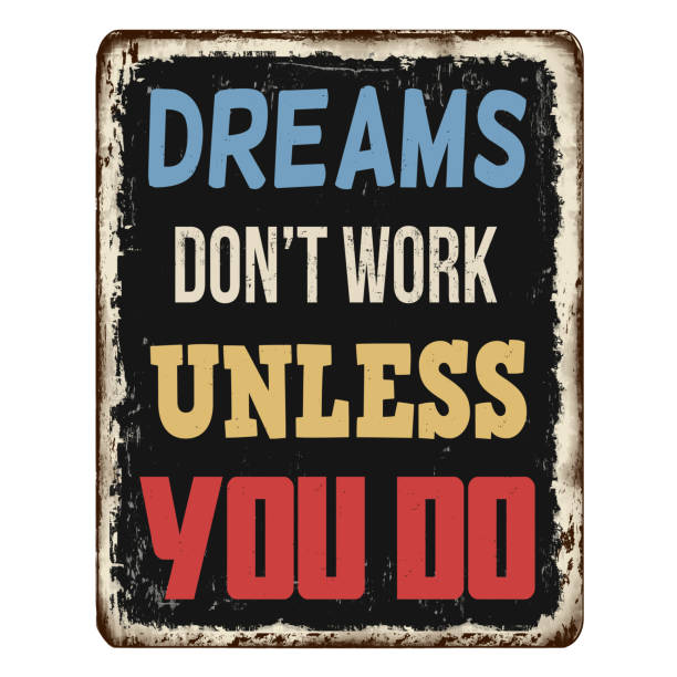 istock Dreams don't work unless you do vintage rusty metal sign 1394634912