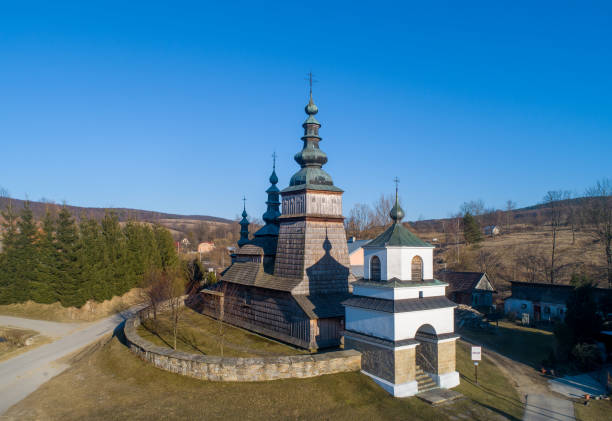 Old wooden orthodox church in Owczary, Poland. Aerial view. stock photo