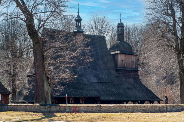 Old Gothic wooden church in Sekowa, Poland. UNESCO World Heritage Site stock photo