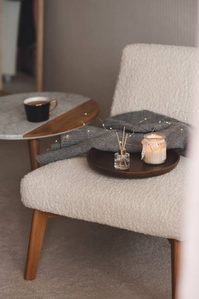 istock Home perfume with candle in chair indoor 1394636019