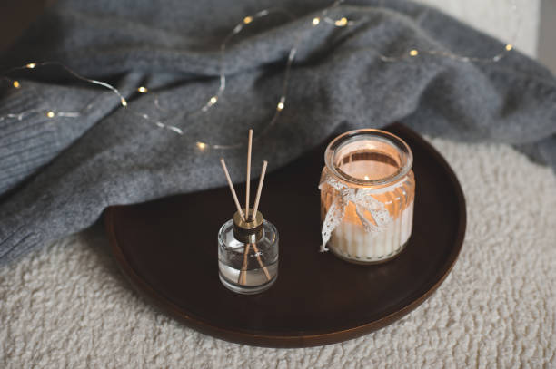 istock Home perfume with candle in chair indoor 1394636020
