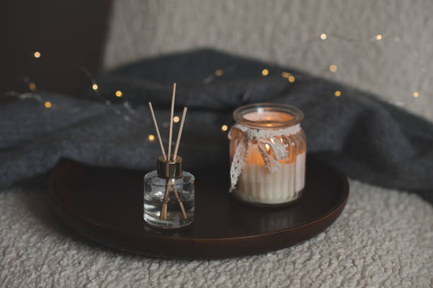 istock Home perfume with candle in chair indoor 1394636242