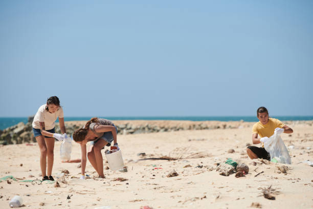 istock Volunteers Cleaning Marine Debris 1394636346