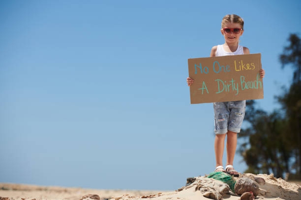 istock Little Activist with Placard 1394636410
