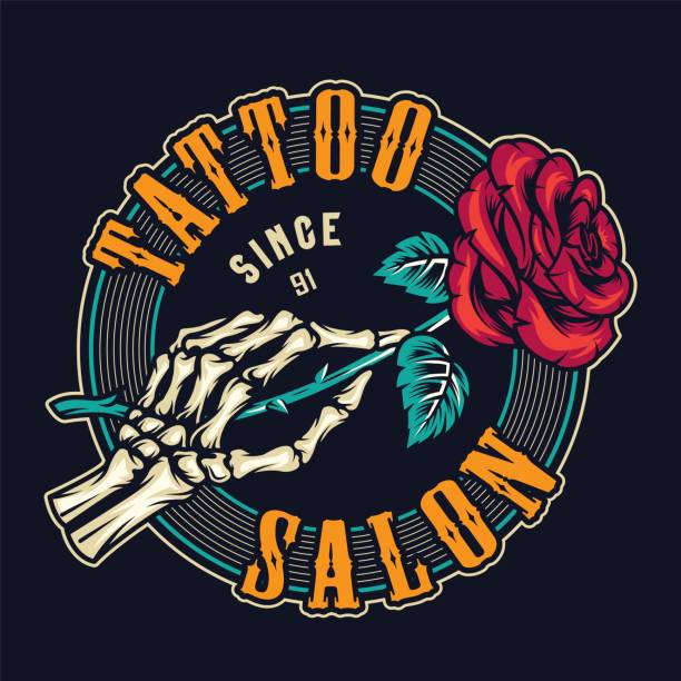 Tattoo studio colorful round print Tattoo studio colorful round print with skeleton hand holding blooming rose flower in vintage style isolated vector illustration skeloton hand stock illustrations