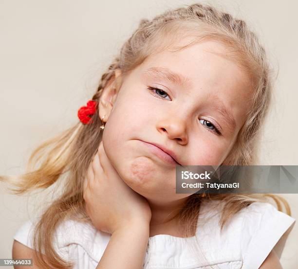 A Portrait Of A Young Girl With A Sore Throat Stock Photo - Download Image Now - Child, Sore Throat, Children Only