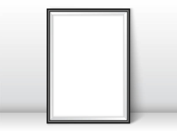istock Photoframe template. Silver picture framing mockup. Frame near the wall on the floor with realistic shadows. Vector template for presentation your photo art or other crafts. 1394640365